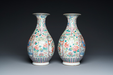 A pair of Chinese famille rose vases with elephant handles, 19th C.