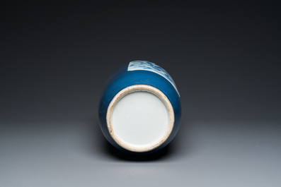 A Chinese blue-ground rouleau vase with blue and white landscape panels, 19th C.