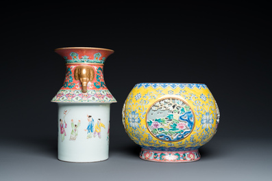 A Chinese reticulated and revolving famille rose vase consisting of two parts, Qianlong mark, 20th C.