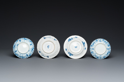 Twelve Chinese blue and white saucers and eight cups, Kangxi