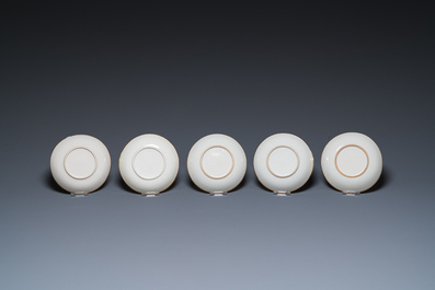 Onze soucoupes et dix tasses en porcelaine de Chine monogramm&eacute;es 'PM' sur fond dor&eacute;, Yongzheng/Qianlong