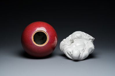 A Chinese sang-de-boeuf-glazed jar, a blanc de Chine Buddha and two plates, 19th C.