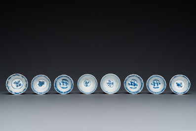 Twelve Chinese blue and white saucers and eight cups, Kangxi