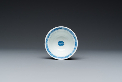 A rare Chinese reticulated double-walled blue and white 'phoenix' cup, Kangxi