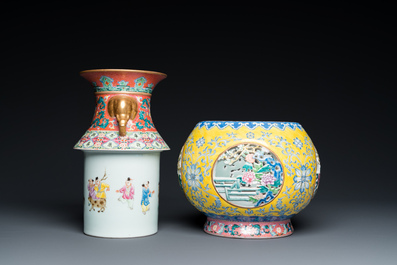 A Chinese reticulated and revolving famille rose vase consisting of two parts, Qianlong mark, 20th C.