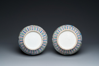 A pair of Chinese famille rose vases with elephant handles, 19th C.