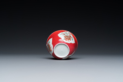 A Chinese famille rose ruby-ground cup and saucer, Yongzheng