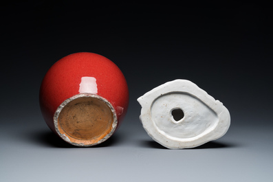 A Chinese sang-de-boeuf-glazed jar, a blanc de Chine Buddha and two plates, 19th C.
