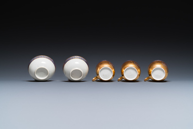 Onze soucoupes et dix tasses en porcelaine de Chine monogramm&eacute;es 'PM' sur fond dor&eacute;, Yongzheng/Qianlong