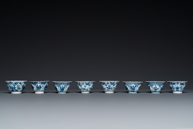 Twelve Chinese blue and white saucers and eight cups, Kangxi