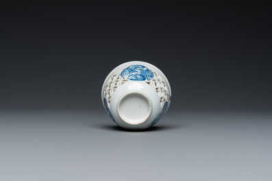 A rare Chinese reticulated double-walled blue and white 'phoenix' cup, Kangxi