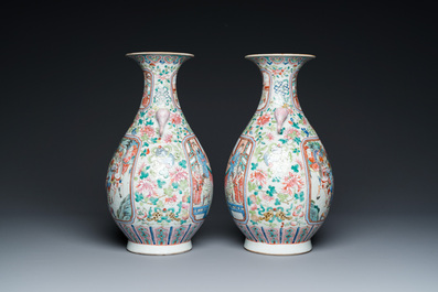A pair of Chinese famille rose vases with elephant handles, 19th C.