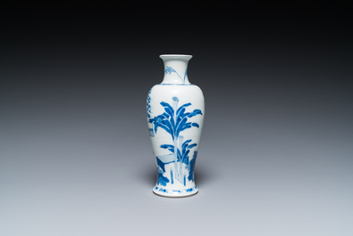 A Chinese blue and white 'two ladies and a boy' vase, Kangxi