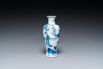 A Chinese blue and white 'two ladies and a boy' vase, Kangxi