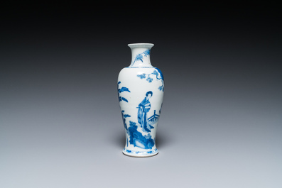 A Chinese blue and white 'two ladies and a boy' vase, Kangxi