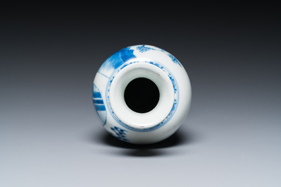 A Chinese blue and white 'two ladies and a boy' vase, Kangxi