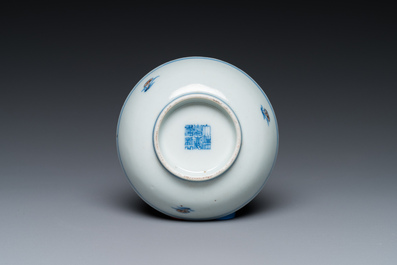 A Chinese doucai 'phoenix' saucer, Jiaqing mark, 19th C.