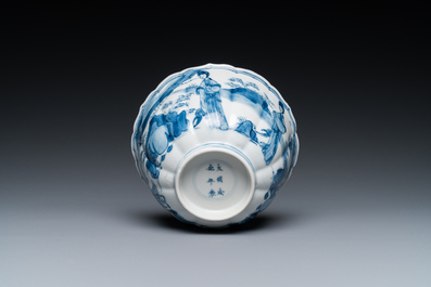 A Chinese blue and white bowl with figures in a landscape, Chenghua mark, Kangxi