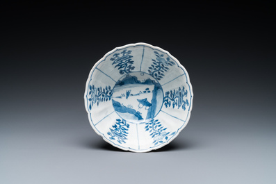 A Chinese blue and white bowl with figures in a landscape, Chenghua mark, Kangxi