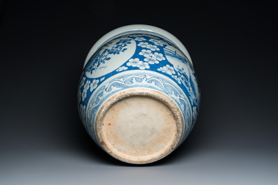 A Chinese blue and white fish bowl with medallions on a prunus-ground, 19th C.