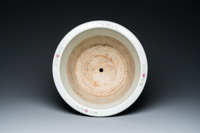 A Chinese pink-ground famille rose jardini&egrave;re, 19th C.