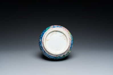 A Chinese wucai bottle vase with birds surrounded by fruits and foliage, Transitional period