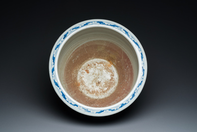 A Chinese blue and white fish bowl with medallions on a prunus-ground, 19th C.