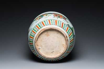 A Chinese famille verte fish bowl with warriors on horseback, 19th C.