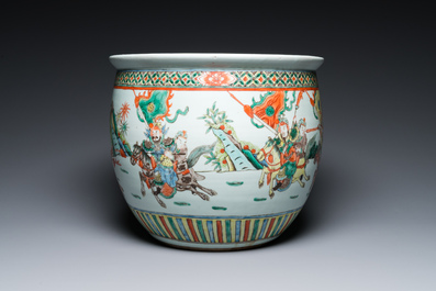 A Chinese famille verte fish bowl with warriors on horseback, 19th C.