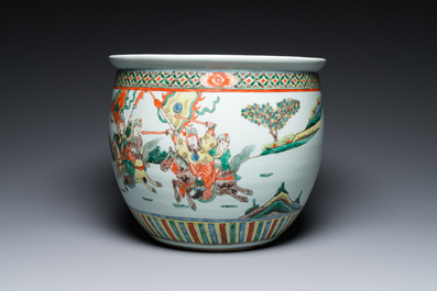 A Chinese famille verte fish bowl with warriors on horseback, 19th C.