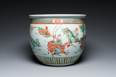 A Chinese famille verte fish bowl with warriors on horseback, 19th C.