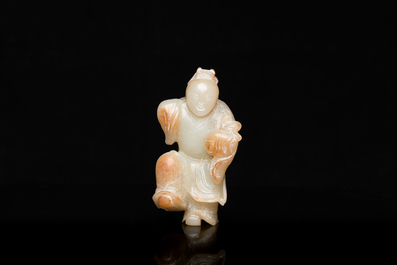 A Chinese jade sculpture of a boy, 18/19th C.