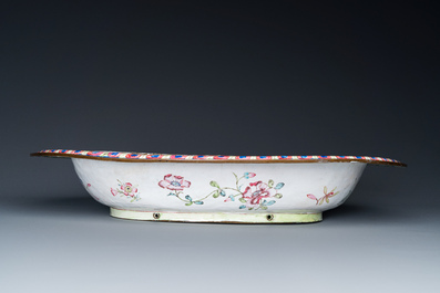 A large Chinese Canton enamel basin with garlands decorated with male heads, Qianlong