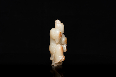 A Chinese jade sculpture of a boy, 18/19th C.