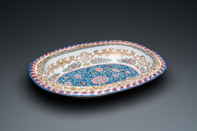 A large Chinese Canton enamel basin with garlands decorated with male heads, Qianlong