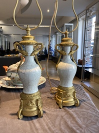 A pair of Chinese gilt bronze lamp-mounted crackle-glazed vases, 18/19th C.