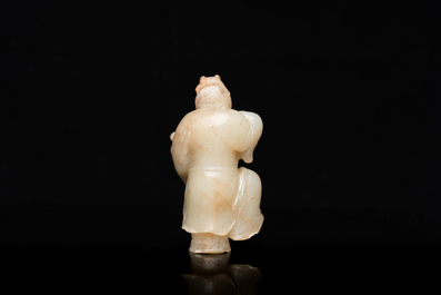 A Chinese jade sculpture of a boy, 18/19th C.