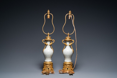 A pair of Chinese gilt bronze lamp-mounted crackle-glazed vases, 18/19th C.