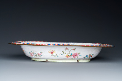 A large Chinese Canton enamel basin with garlands decorated with male heads, Qianlong