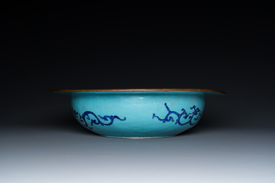 A Chinese Canton enamel turquoise-ground basin and a blue-ground dish, 18/19th C.