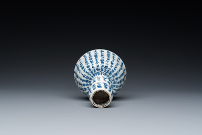 A Chinese blue and white inscribed candlestick, Jin Yu Zhu Ji 金玉珠記 mark, 19th C.
