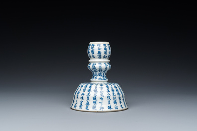 A Chinese blue and white inscribed candlestick, Jin Yu Zhu Ji 金玉珠記 mark, 19th C.