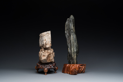 Two Chinese 'gongshi or 'scholar's rocks' on wooden stands, Ming or later