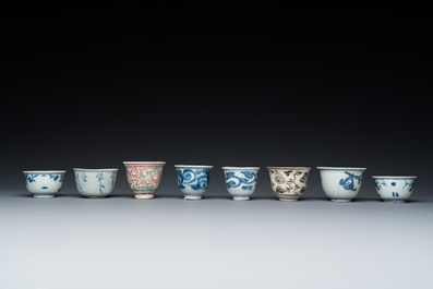 Eight Chinese mostly blue and white wine and tea cups, Ming