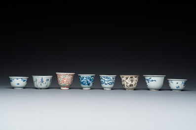 Eight Chinese mostly blue and white wine and tea cups, Ming
