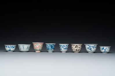 Eight Chinese mostly blue and white wine and tea cups, Ming