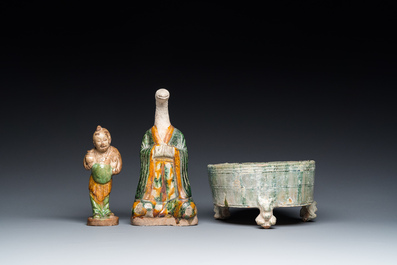 Two Chinese sancai-glazed figures and a green-glazed tripod censer, Han and later
