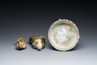 Two Chinese sancai-glazed figures and a green-glazed tripod censer, Han and later
