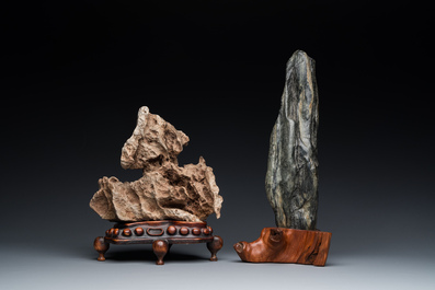 Two Chinese 'gongshi or 'scholar's rocks' on wooden stands, Ming or later