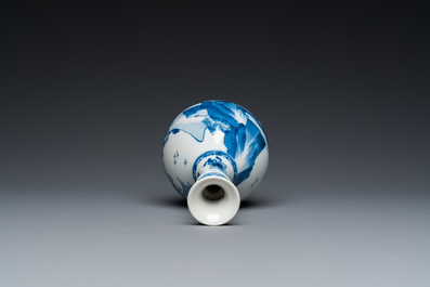 A Chinese blue and white bottle vase with figures in a landscape, Kangxi